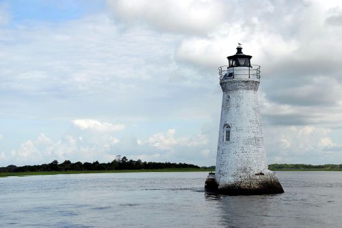 lighthouse beacon water