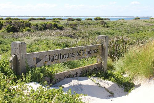 lighthouse sign beach