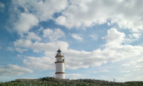 lighthouse sky clouds