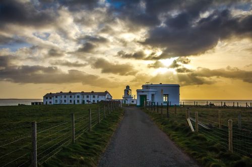 lighthouse in the evening clouds