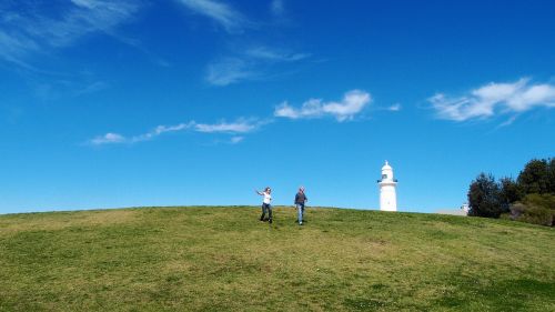 lighthouse grass hill