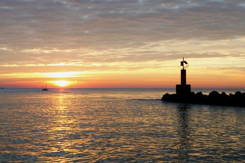 lighthouse mediterranean beach