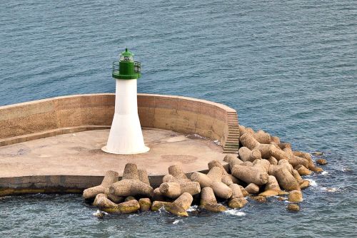 lighthouse white green sea