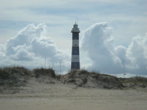 lighthouse loneliness beach cloud