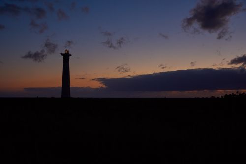 lighthouse evening sky beach