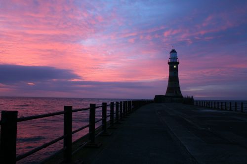 lighthouse sunrise sky