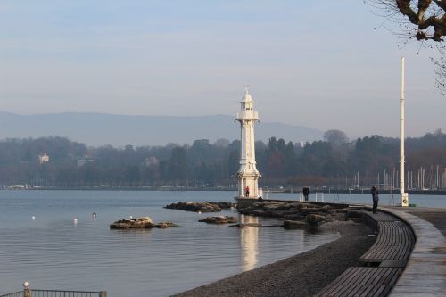 lighthouse sea reflection