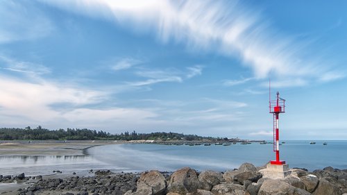 lighthouse  beach  blue sky