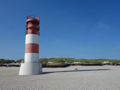 lighthouse sand beach
