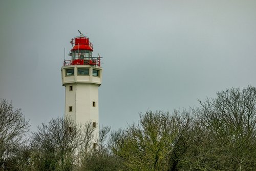 lighthouse  side  sea