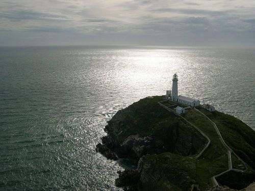 lighthouse cliffs ocean