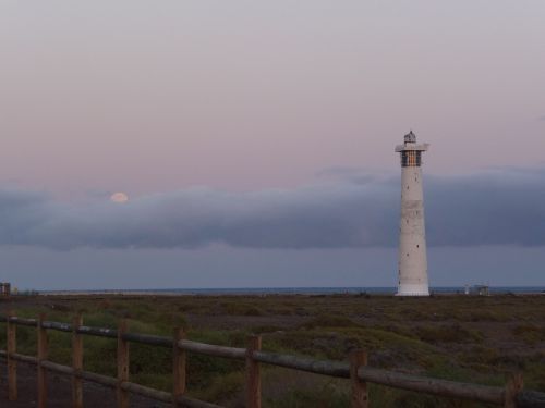 lighthouse moon evening