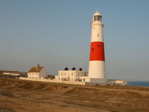 lighthouse sea sunset