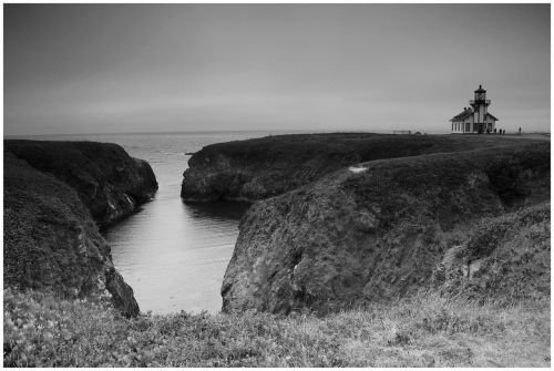 lighthouse shoreline ocean