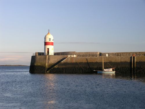 lighthouse harbor boat