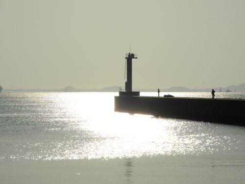 Lighthouse In Bright Sea