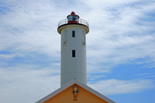 Lighthouse With White Clouds