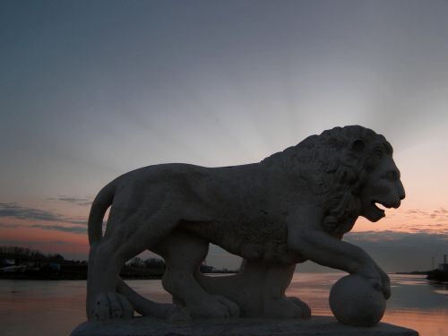 lion sculpture sunset