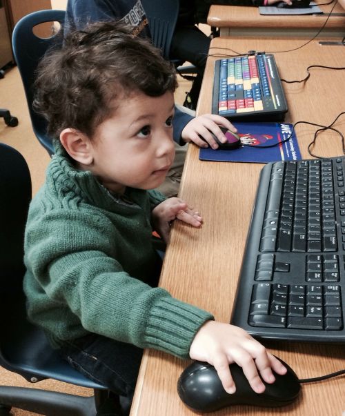 little boy little techie boy with computer