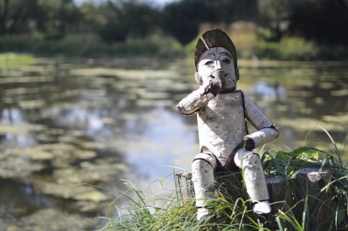 little man wood doll water