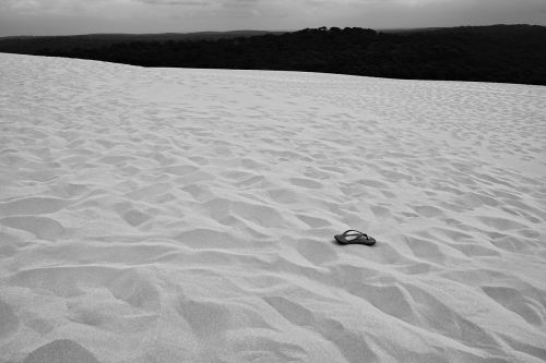 lost shoe in the sand