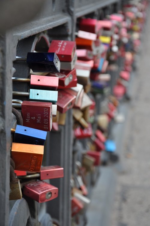 love locks  bridge railing  romantic