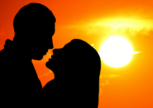 lovers silhouette sunset