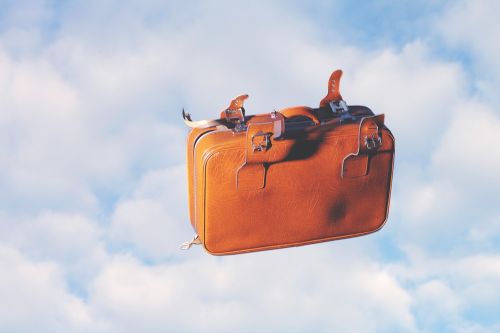 luggage flying sky