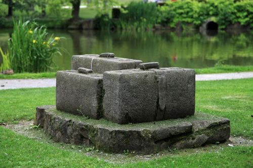 luggage stone sculpture