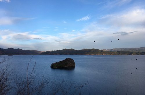 lugu lake  small luo water  mountains