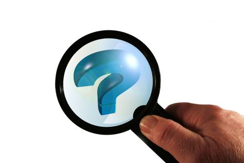 magnifying glass question mark globe