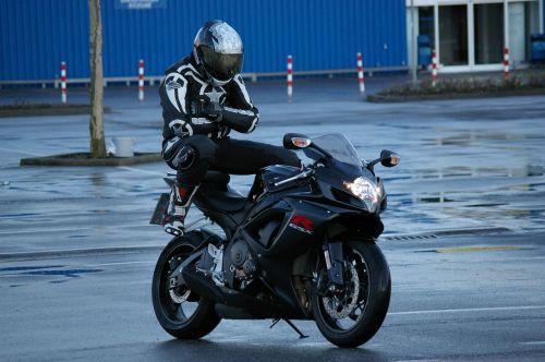 man motorcycle pillion