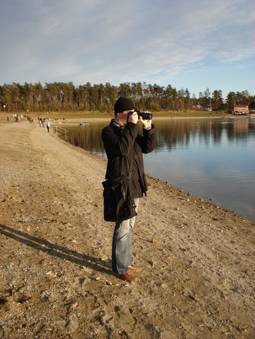 man photographer lake