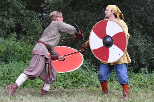 man fighting sword