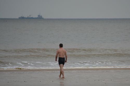 man swimming trunks sea