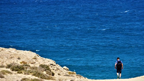 man  ocean  hiking