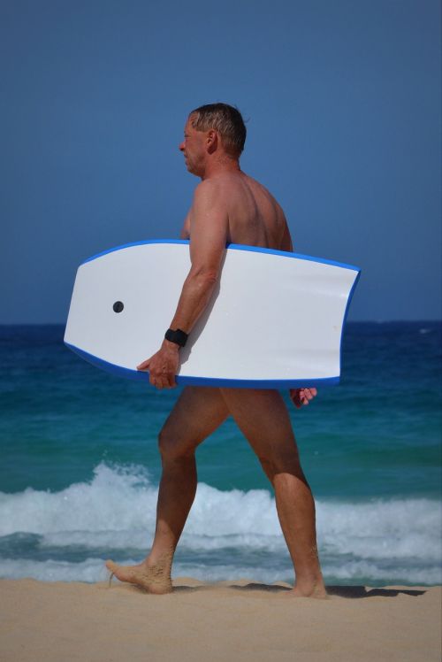 man surfboard sea