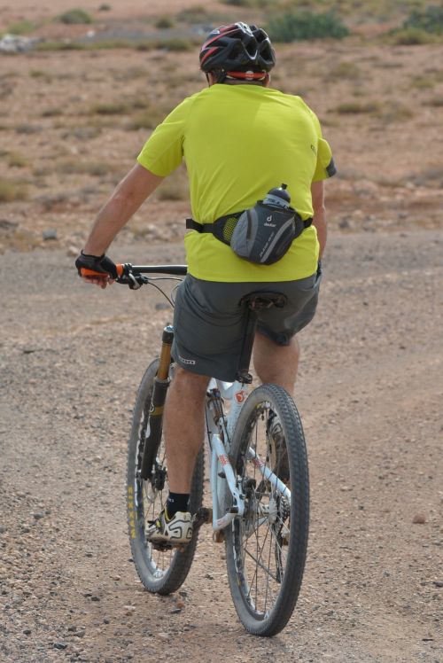 man cycling mountain bike
