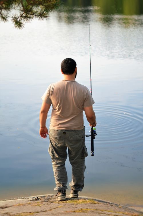 man fishing water