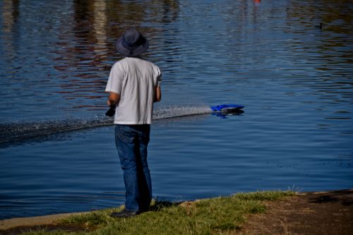 Man With Radio Controlled Boat