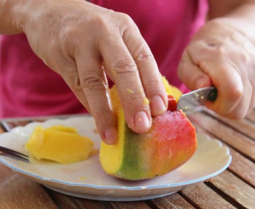 mango hand fruit