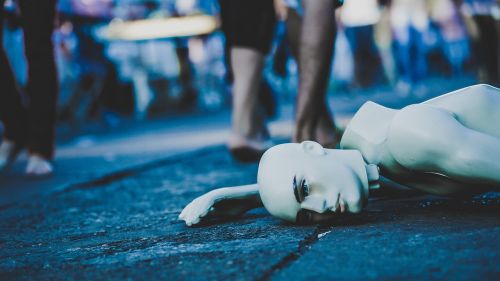 mannequin lying down street