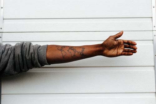 map tattoo hand