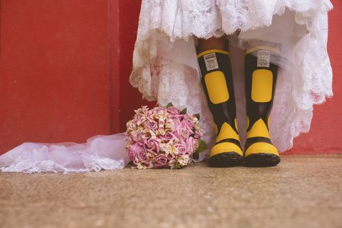 boots bridal bouquet white dress