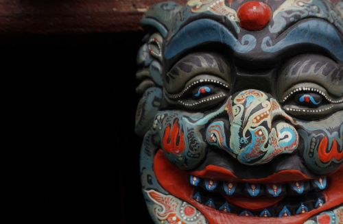 mask wood carving hanging temple