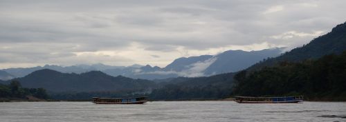 mekong boat mountains