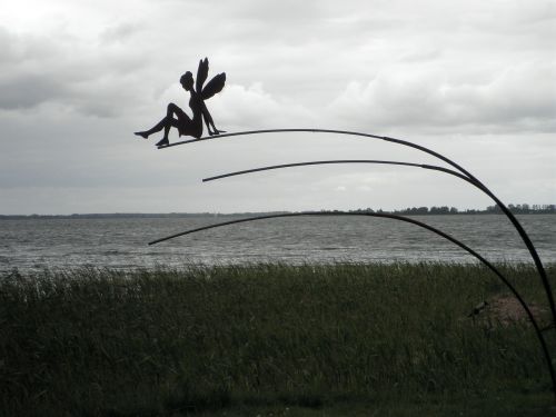 metal art elf on the water