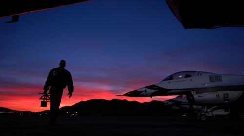 military airman flight preparation sunrise