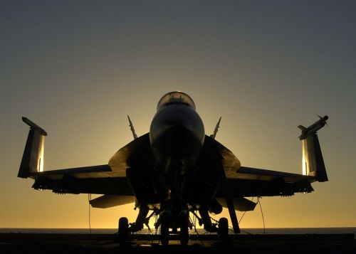 military jet sunset silhouette