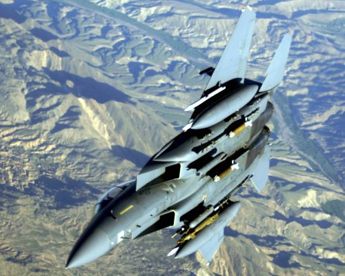military jet mountains f-15